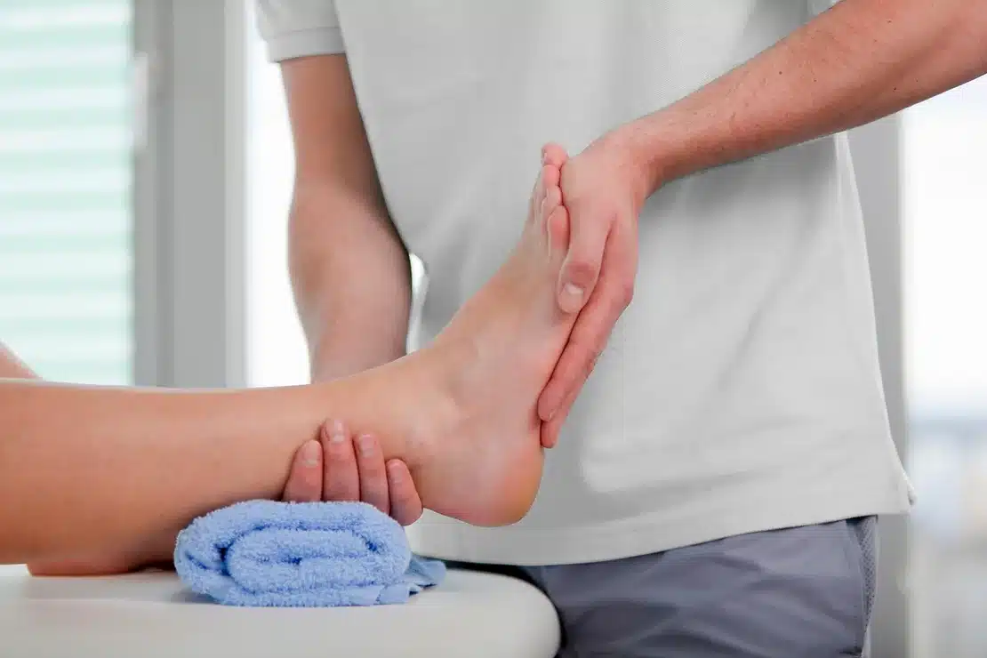 Foot being examined by physical therapist